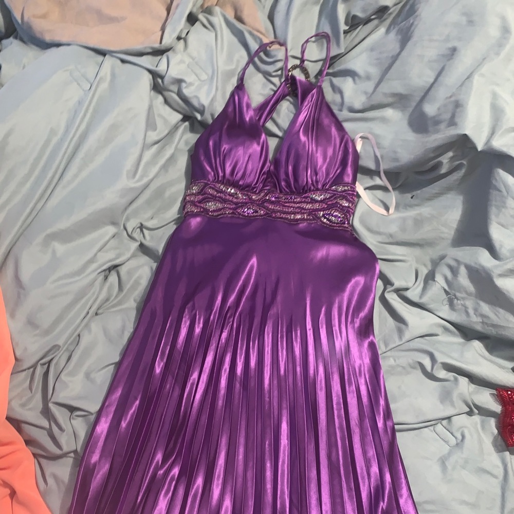 Floor length purple ruffled prom dress